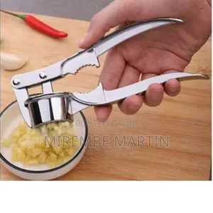 Round Stainless Steel Garlic Press.