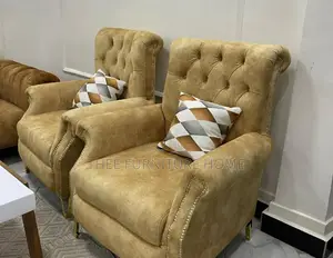 Photo - Chesterfield Wing Back Sofas in Brown