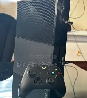 Xbox One With Two Games and One Pad