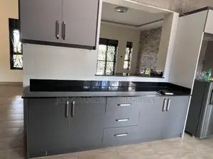 Black Galaxy and White Marble Countertops
