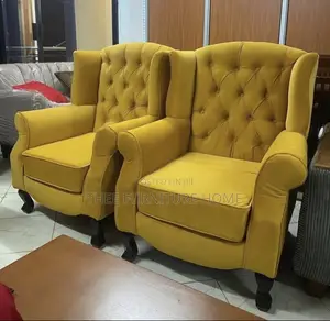 Photo - Two Chesterfield Wing Back Sofas