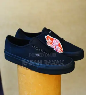 Photo - Original Triple Black Unisex Vans Off the Wall Sneakers