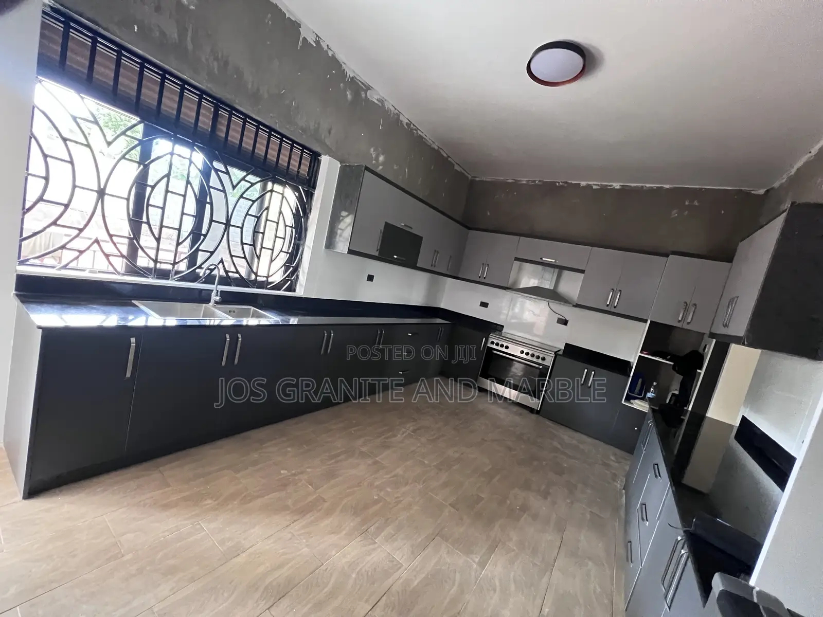 Black Galaxy and White Marble Countertops