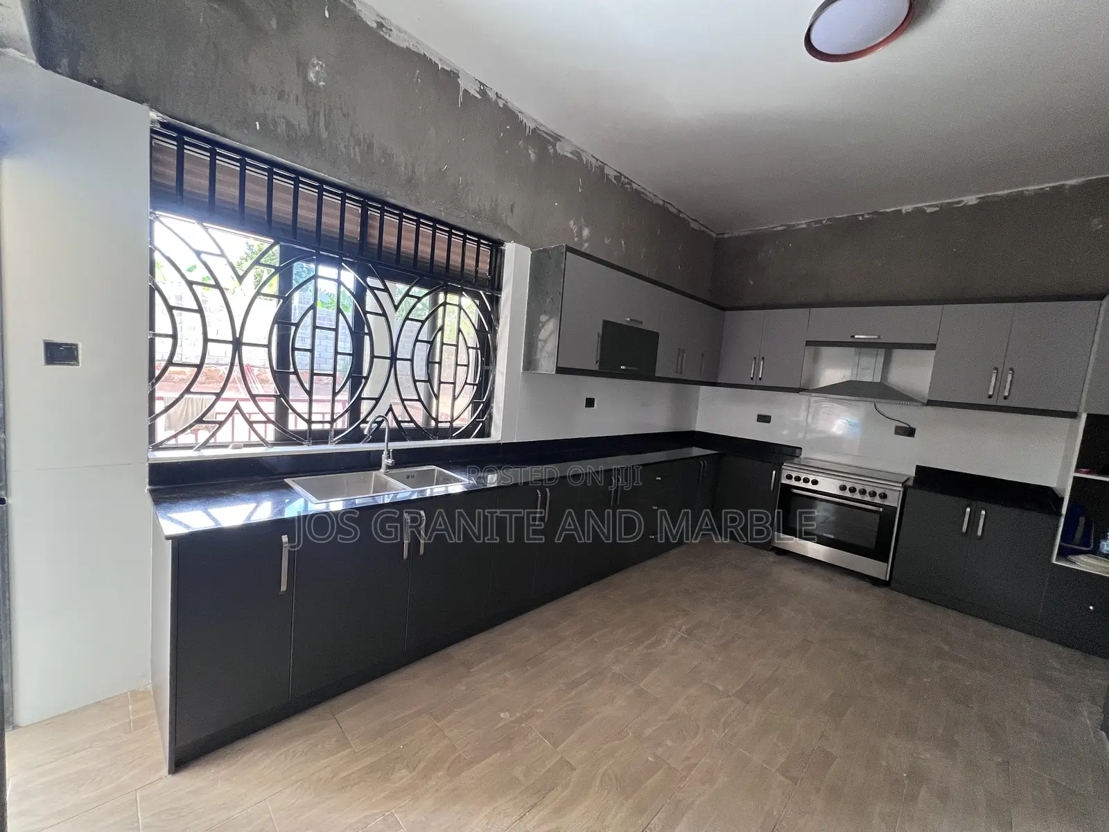Black Galaxy and White Marble Countertops