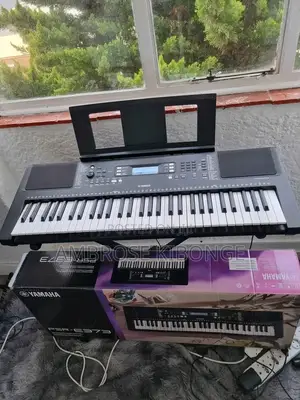 Genuine Original Yamaha PSR-E373 Portable Keyboard.