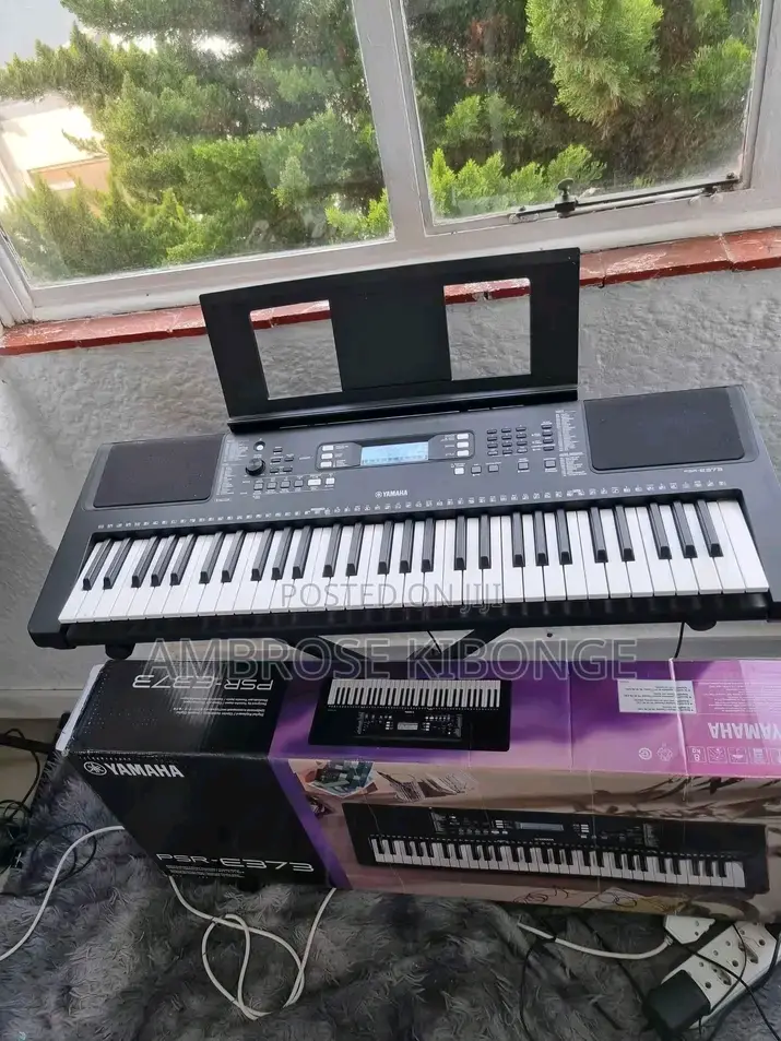 Genuine Original Yamaha PSR-E373 Portable Keyboard.