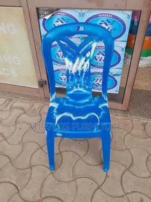 Photo - White Blue Brown Plastic Chairs