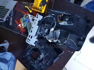 Photo - Repairing of Projectors With Mechanical Problems