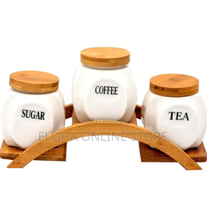 Sets of Tea, Sugar and Coffee Containers With a Wooden Rack