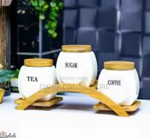 Sets of Tea, Sugar and Coffee Containers With a Wooden Rack