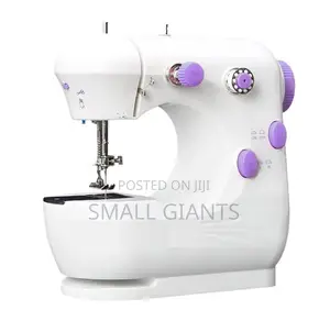 Photo - Portable Electric Mini Sewing Machine