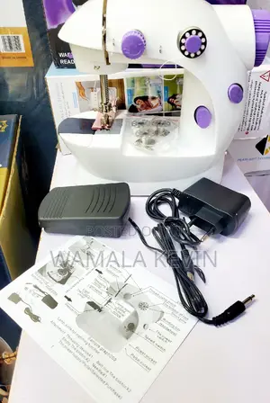 Portable Electric Sewing Machine.
