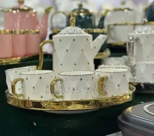 Rotating Tray , Cups and Kettle Gold White.