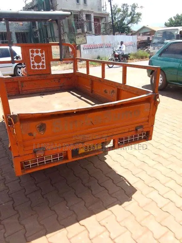 Tricycle 2023 Orange