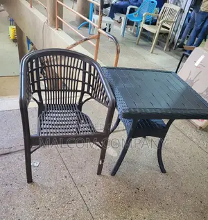 Home Coffe Table and Strong Plastic Chair.