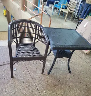 Home Coffe Table and Strong Plastic Chair.