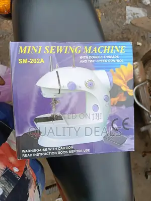 Mini Portable Sewing Machine