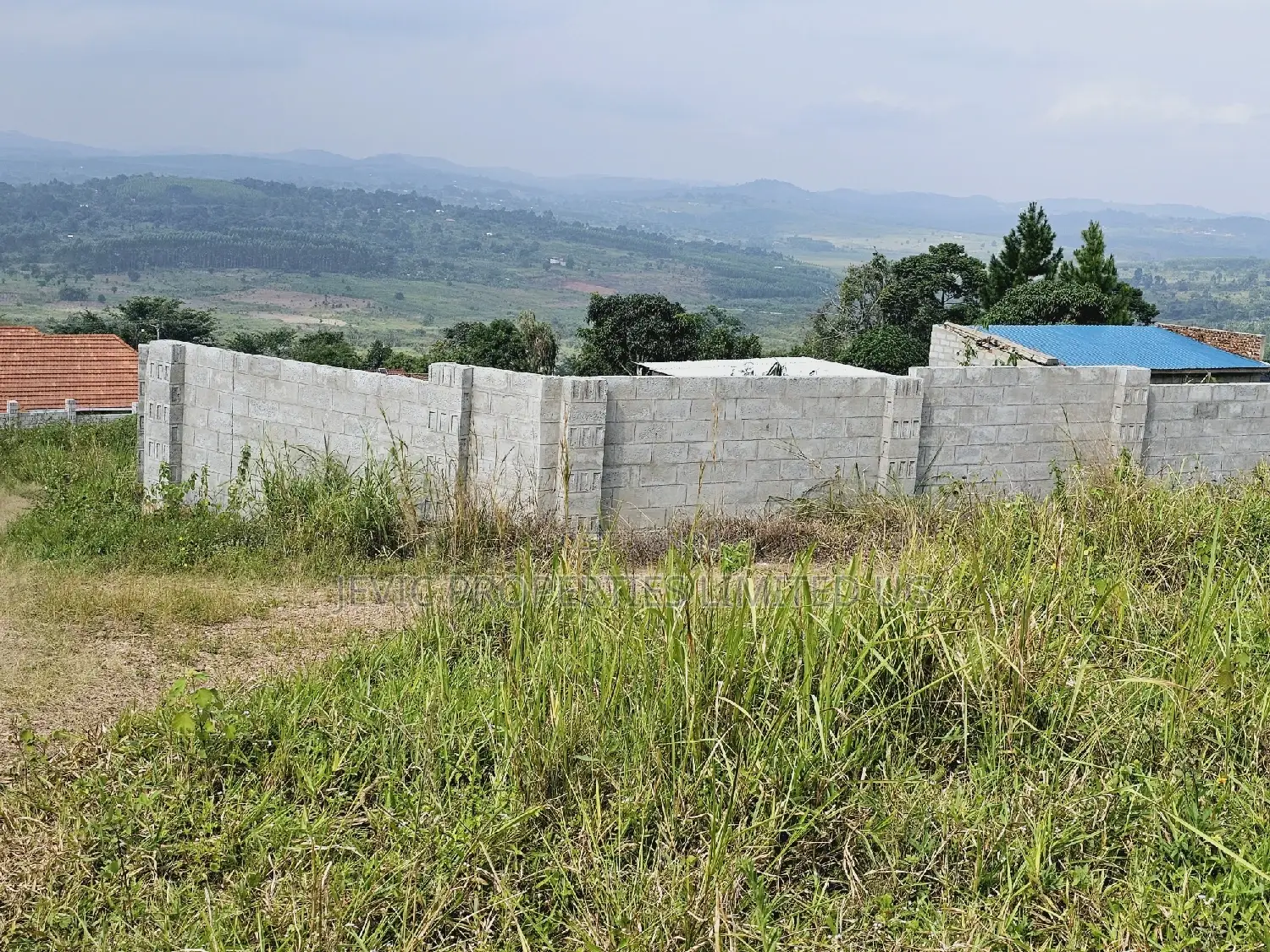 Quick Sale , Land at Kakiri Kikugi 2km Off Tarmac Police
