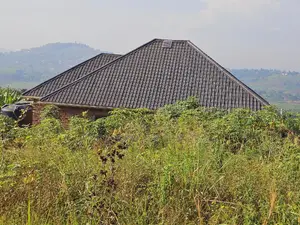 Quick Sale , Land at Kakiri Kikugi 2km Off Tarmac Police