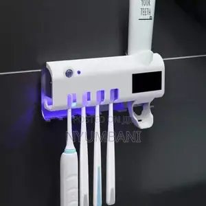 Tooth Paste Dispenser And Sterilizer