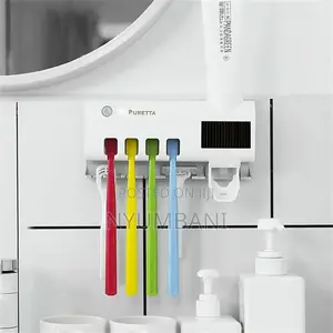 Tooth Paste Dispenser And Sterilizer