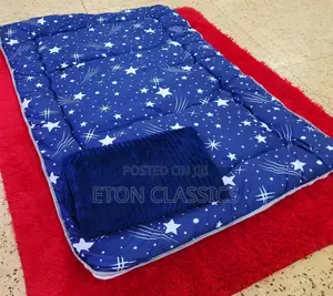 Photo - 4x6 Floor Fibre Blue Matress Foldable With a Throw Blanket