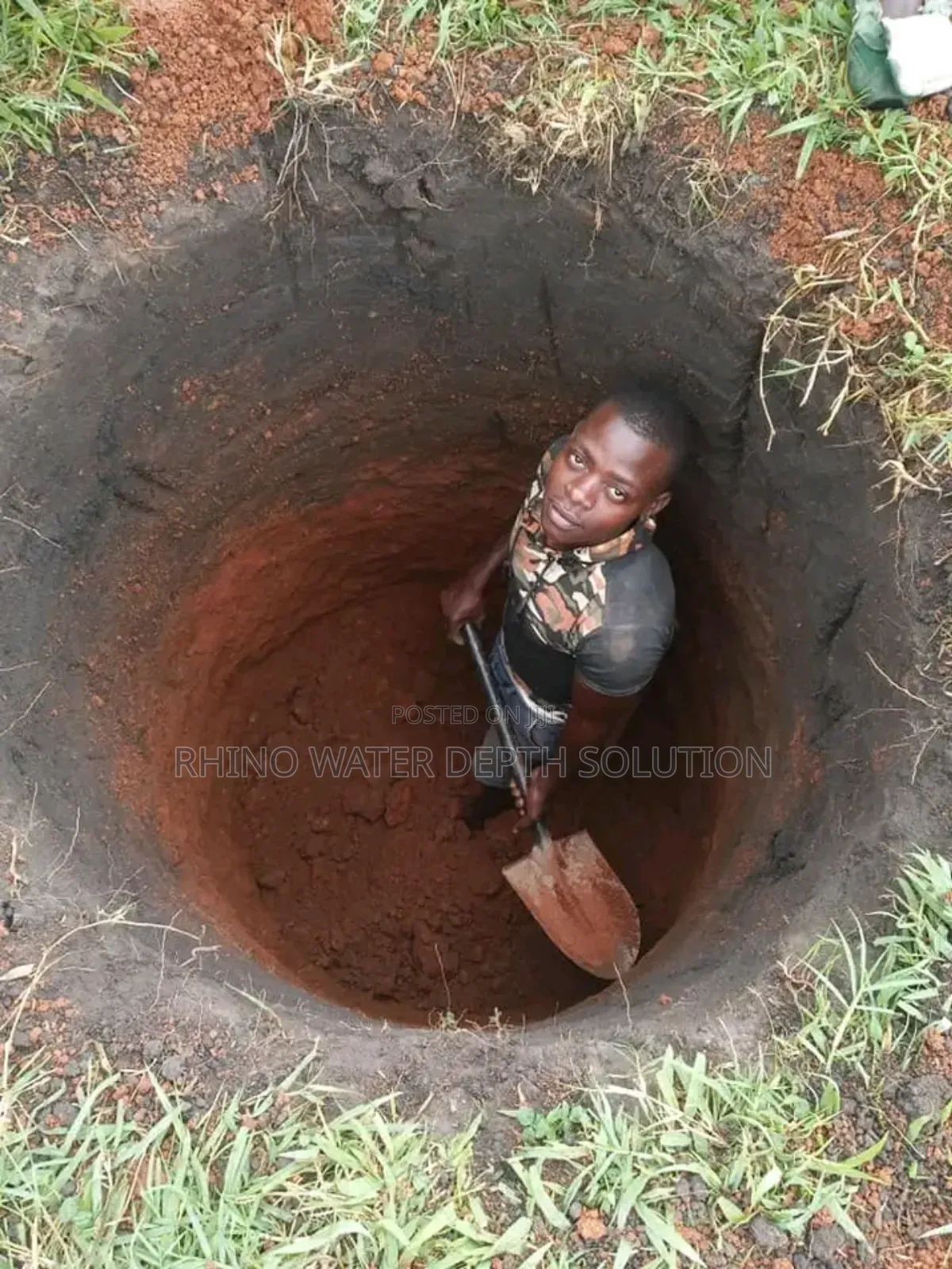 Hand Digging Well With Clean Water