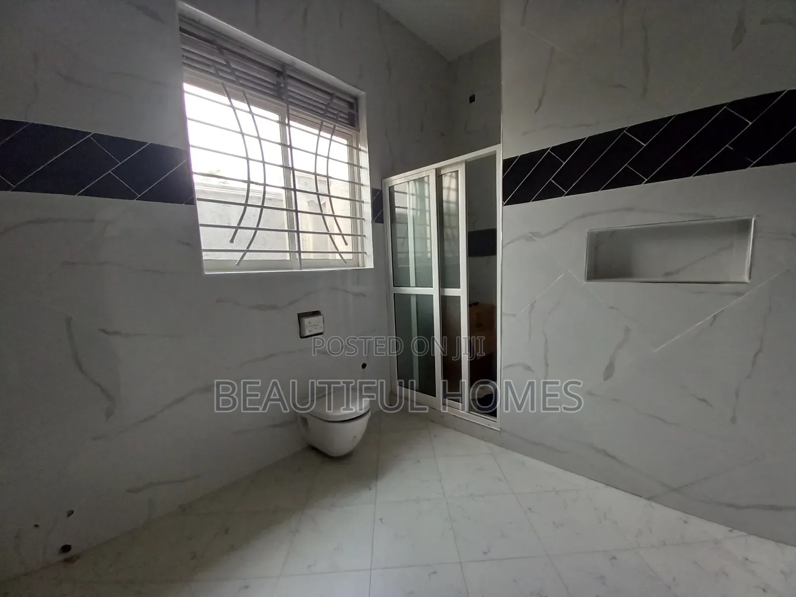 Furnished 4bdrm Bungalow in Kira for sale