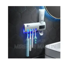 Smart Automatic Toothpaste and Toothbrush Holder.
