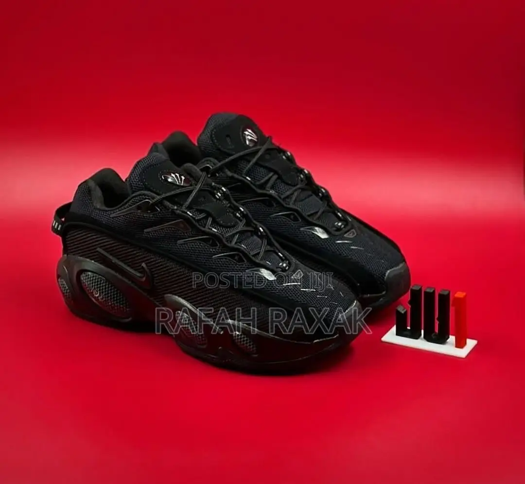 Original Triple Black Nike X Nocta Glide Sneakers