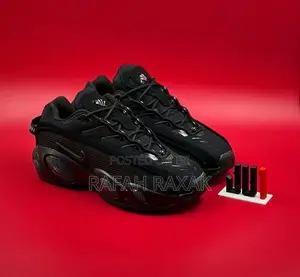 Original Triple Black Nike X Nocta Glide Sneakers