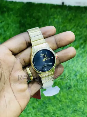 Original Round Black Face Gold “Adimax” Watch