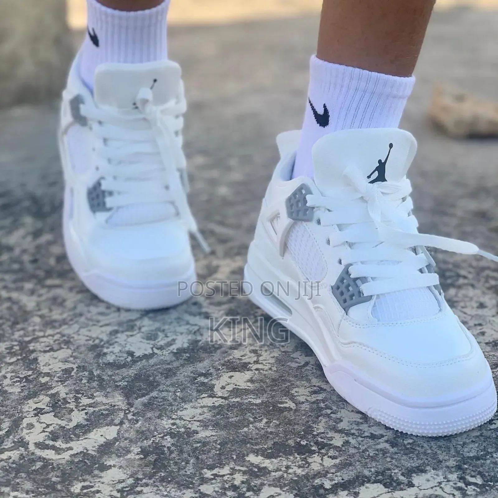 White Air Jordan 4 Retro Sneakers