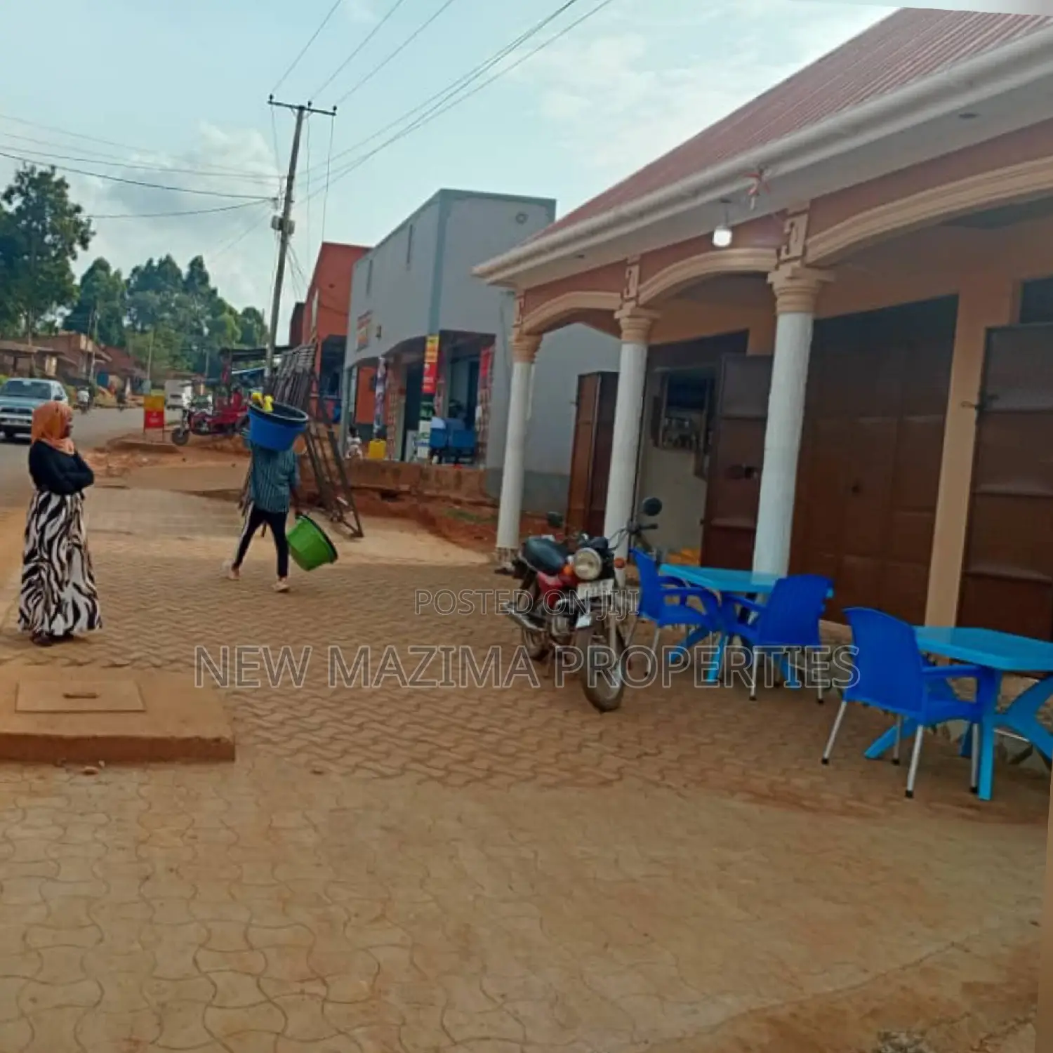 Three Commercial Double Shops With 8 Singles Onsale Nansana
