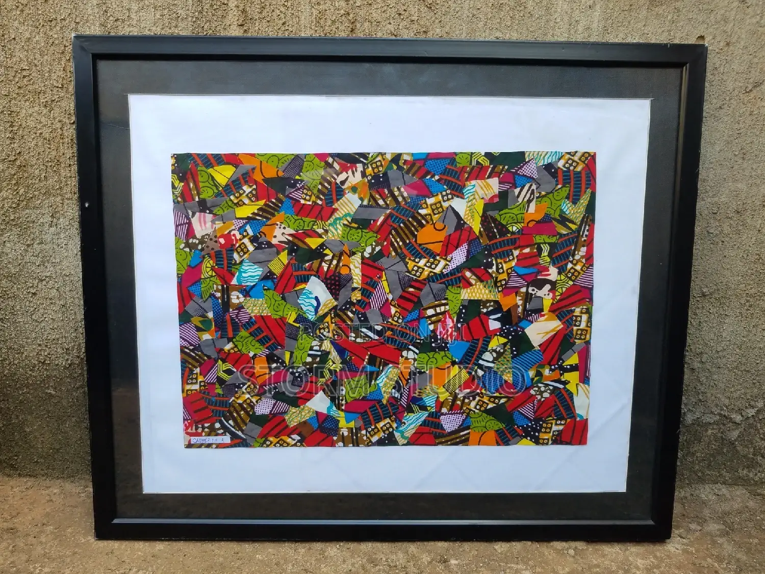 Framed African Print Fabric Art.