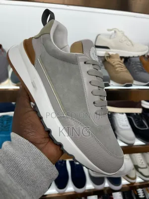 Photo - BRUNELLO Cucinelli Gray Leather Sneakers With Perforations
