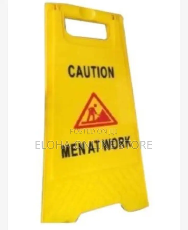Men At Work ( Caution Sign Post)
