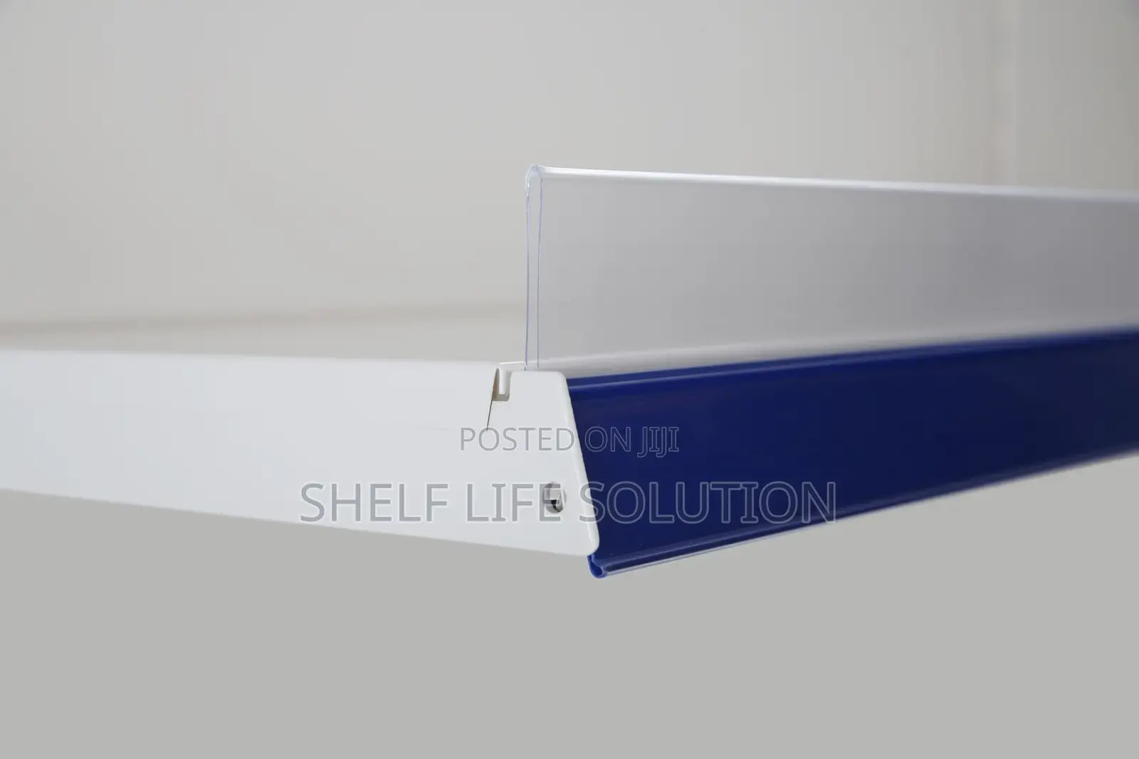 Shelf Riser - Large Plastic Biscuit Stop