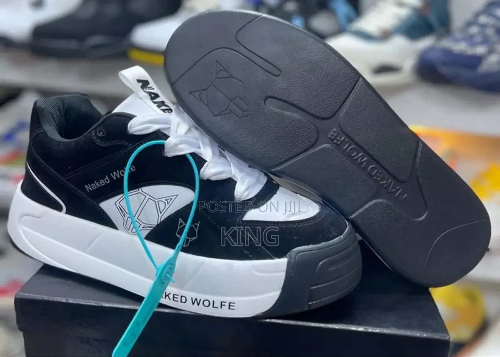 Naked Wolfe White Slider Sneakers. Black
