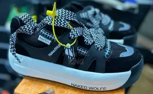Naked Wolfe Slider Premium Sneakers. White Sole