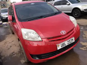 Photo - Toyota Passo Sette 2011 Red