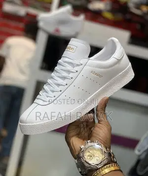 Original Triple White Adidas Topanga Sneakers