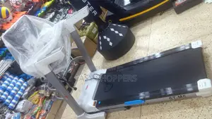 Photo - Treadmill With Auto Incline, Wide Belt, LCD Monitor