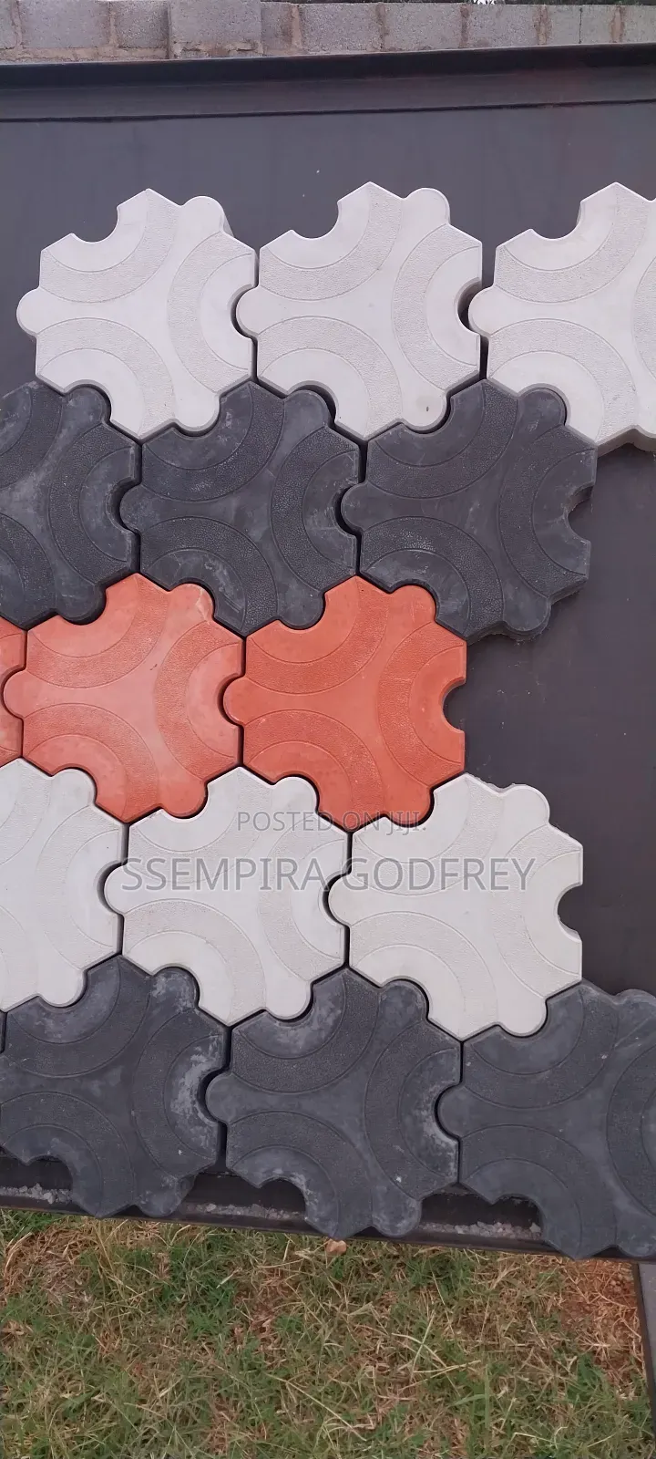Coloured Paving With Red, Grew and Black Designs