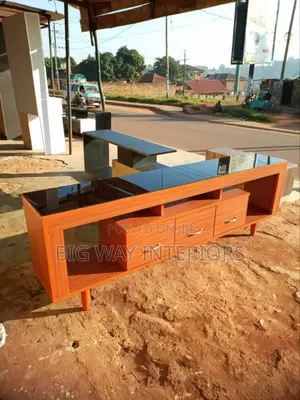 Brown and Black Tv Stand