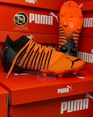 Puma Future Z 1.2 FG Firm Ground/Ag Soccer Boots. Orange"