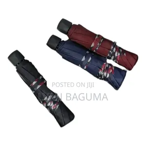 Photo - 3 - Fold Portable Rain / Sun Umbrella