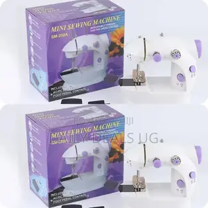 Photo - Home Portable Mini Sewing Machine