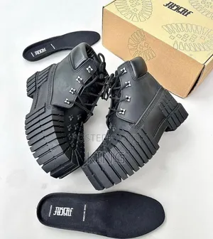 MSCHF 2×4 Black
Suited, Booted, and Extruded Boots