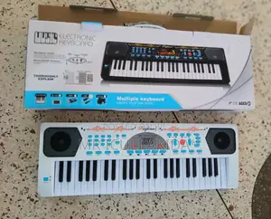 Photo - 49keys Kids Electronic Keyboard With Microphone